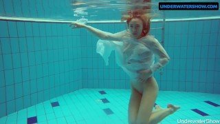 Redhead Diana hot and horny in a white dress